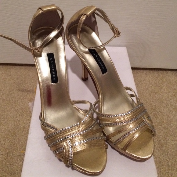 Brand new. Never worn. Gold rhinestones sandals