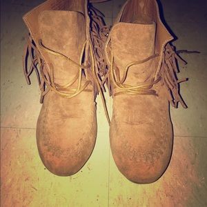 Brown fringe moccasin boots