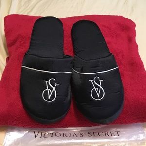 Black Victoria Secrets slippers.