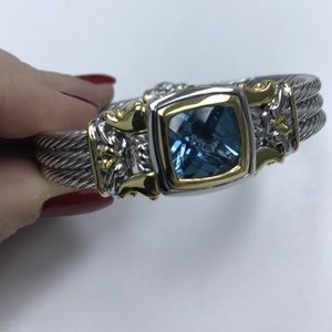 Silver tone and gold tone bracelet