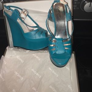 Nib teal Bebe wedges.