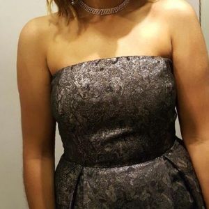 A black and gold dress