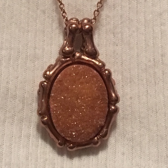 Copper color bamboo with copper Druzy necklace.
