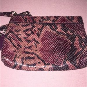 Coach pink snakeskin wristlet