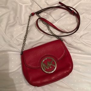 Red Michael Kors cross body purse