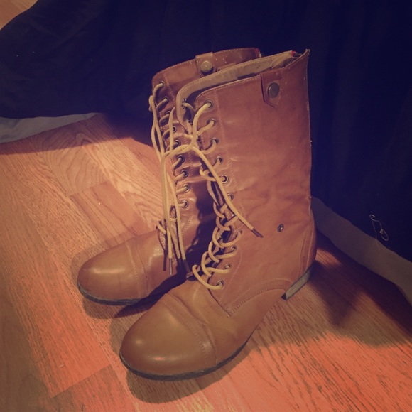 Brown combat boots with leopard print liner