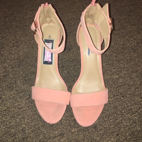 Pink and clear pumps