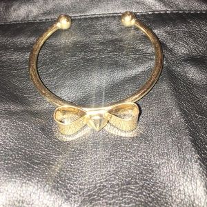 Gold bow tie bracelet
