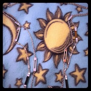 Brown and black trim necklace in gold