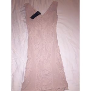 Light pink/ peach form fitting dress