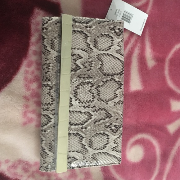 Brand new Steve Madden clutch