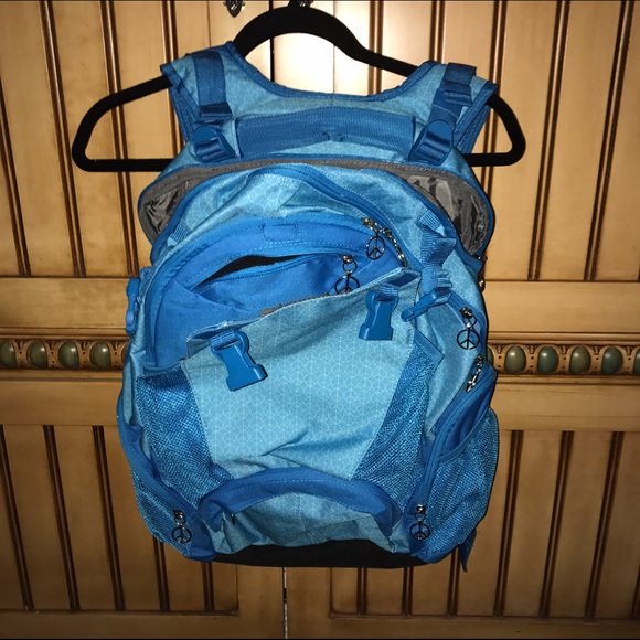 lululemon athletica Handbags - NWOT blue peace sign backpack with lots of zippers