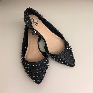 Black studded flats