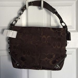 Coach bag, brown in color.