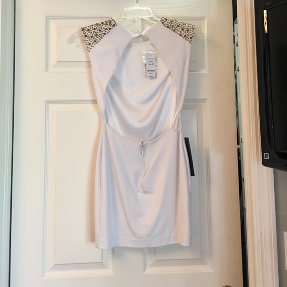 Bebe White shoulder spike dress. - Picture 2 of 2