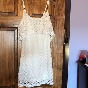 Foreground white lace dress