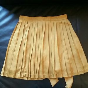 Gap gold pleated skirt with sash.