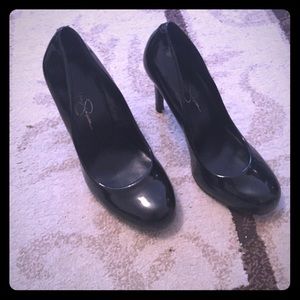 Black patent leather pumps
