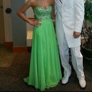 Green corset back, jewels on top.