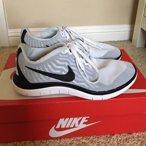 Black and White Nike 4.0 Running Shoes