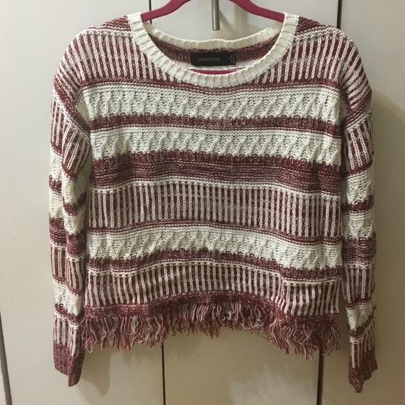 Patterned sweater with fringe detail