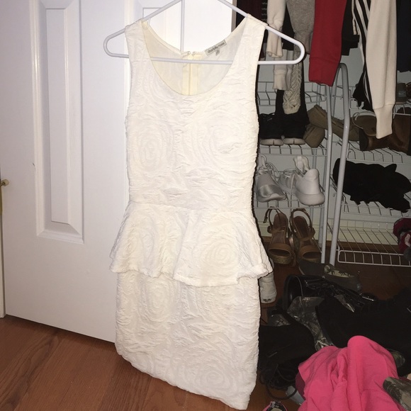 White peplum bodycon dress