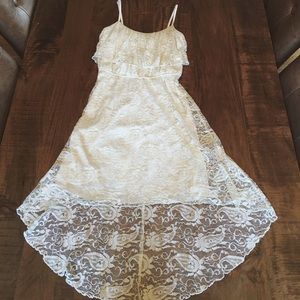 A white high-low dress