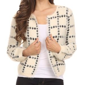 Cream and black cardigan