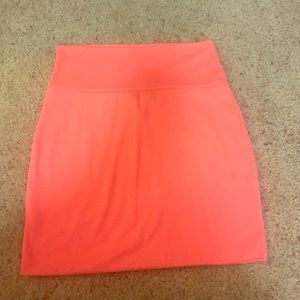 Bright peach mini skirt