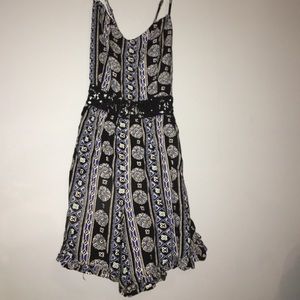 Romper-midriff cutout with crisscross straps