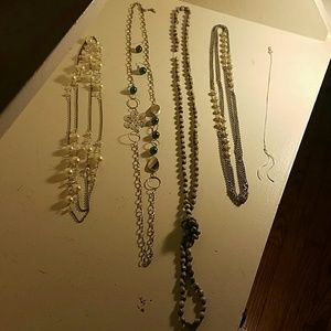 5 necklaces and 1 pair of earrings