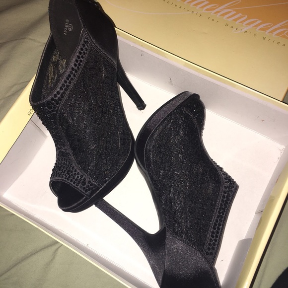 New Michaelangelo black booties size 6.5
