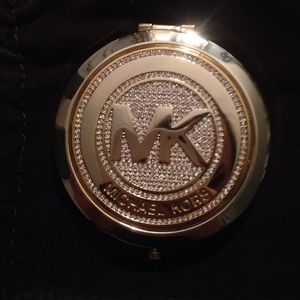 MK Bling compact mirror.