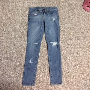Distressed Mossimo low rise skinny jeans
