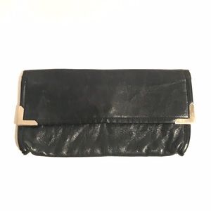 Vintage leather clutch