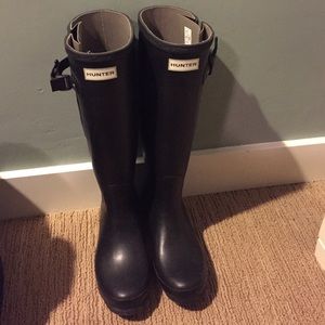 Barley worn black tall hunter rain boots