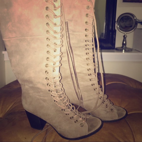 Knee high tan lace up boots