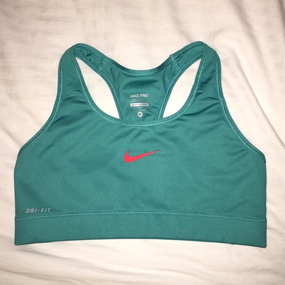 Nike dry fit sports bra teal/orange. Size medium