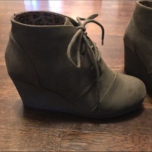 Olive colored wedge booties