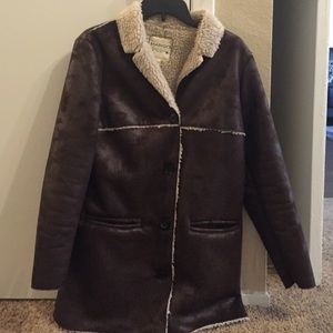 Woman 's Mango coat , leather