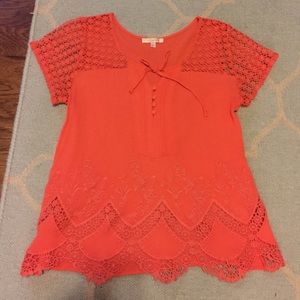Orange short sleeve shirt