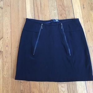 Like new, black, angular zippered skirt.