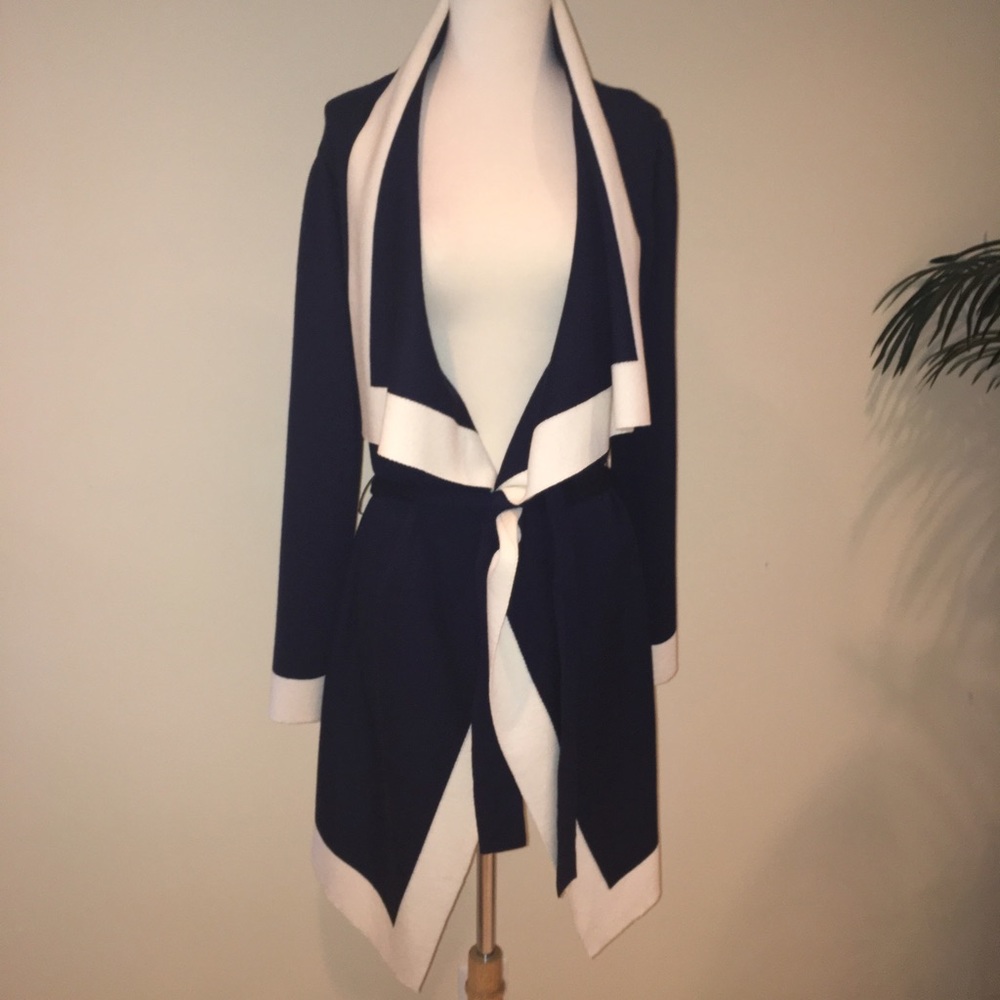 St John versatile navy w white cape w belt.