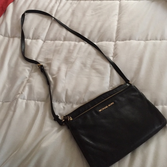 Authentic Michael Korda cross body bag
