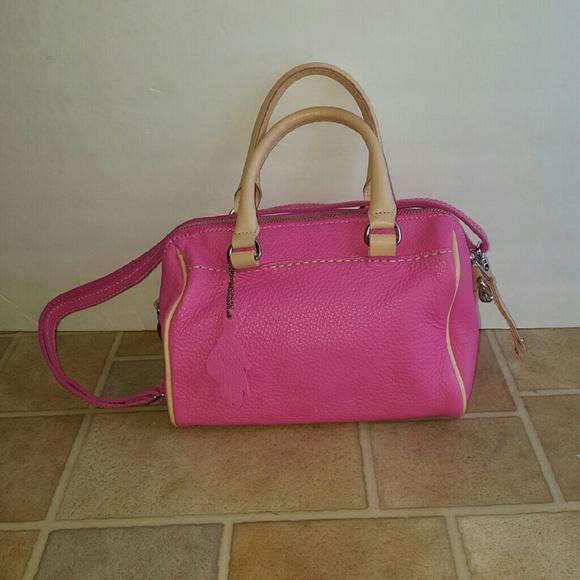 Roots Baby Banff fuchsia leather bag.