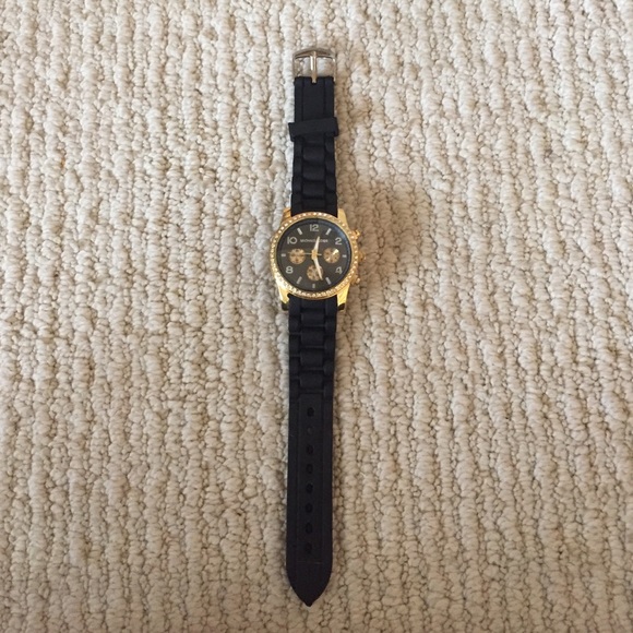 Black and gold Michael Kors watch