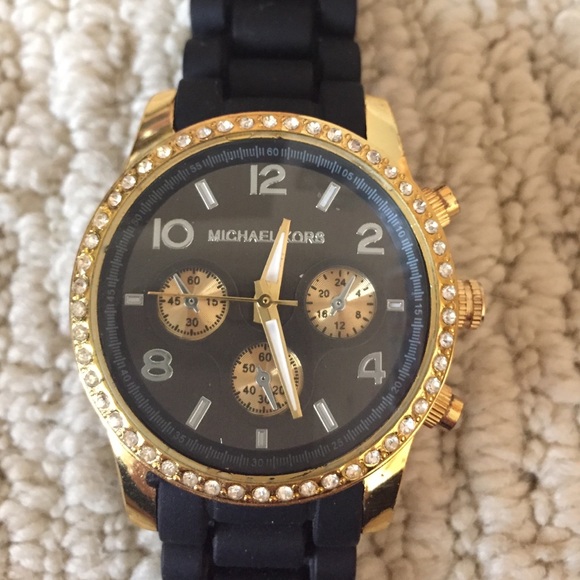 Black and gold Michael Kors watch