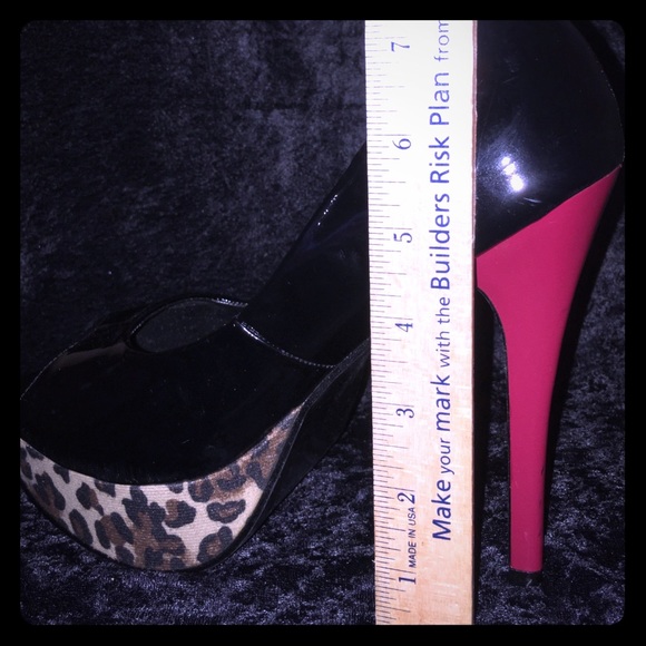 Peep toe black patent leather pumps