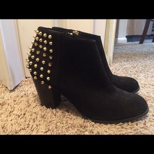 Black suede ankle boots with studs