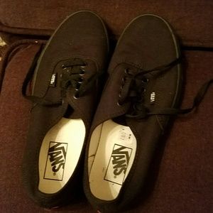 Solid black Vans